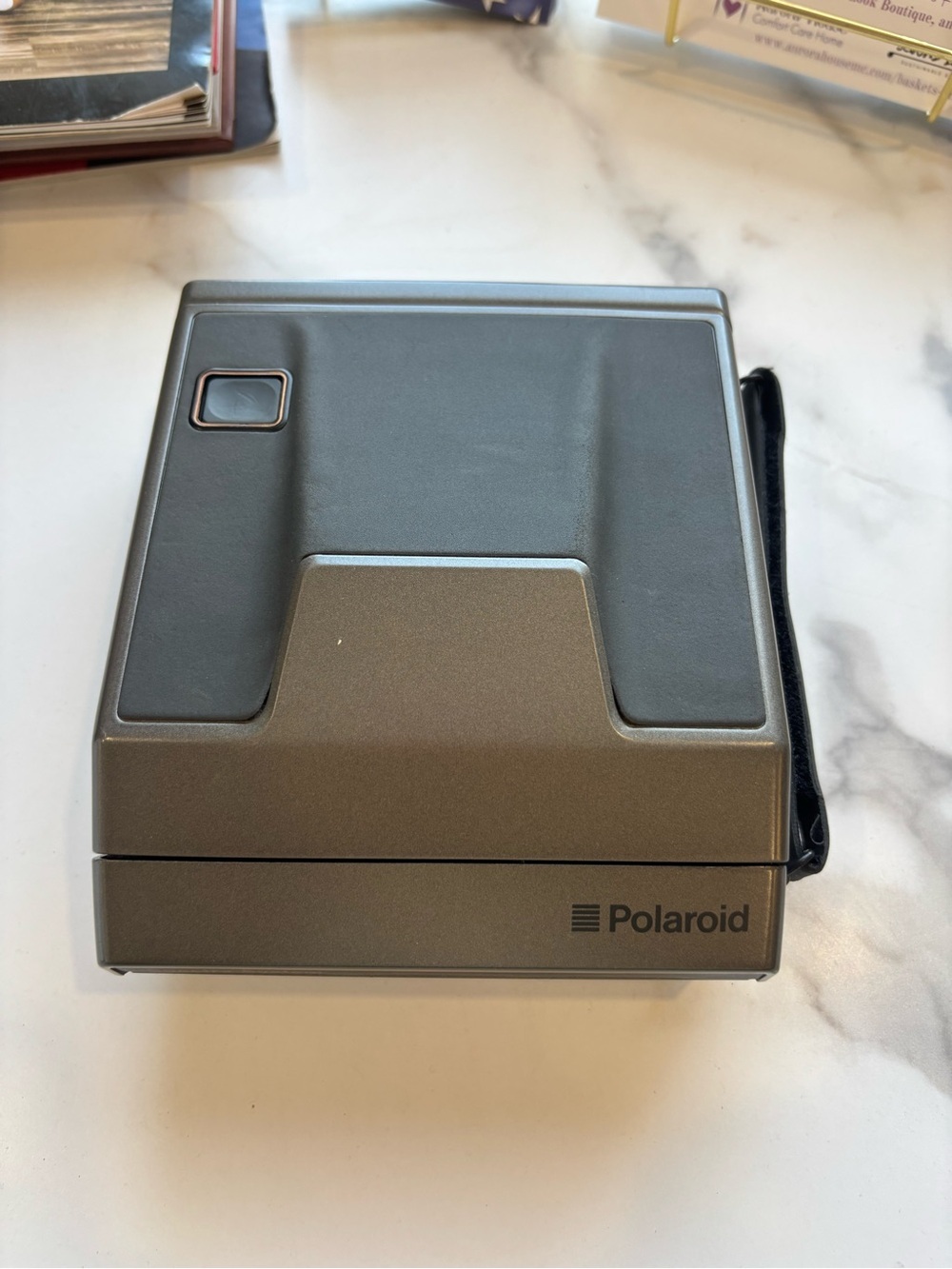 Polaroid vintage Instant Camera in Metallic Silver and Dark Gray